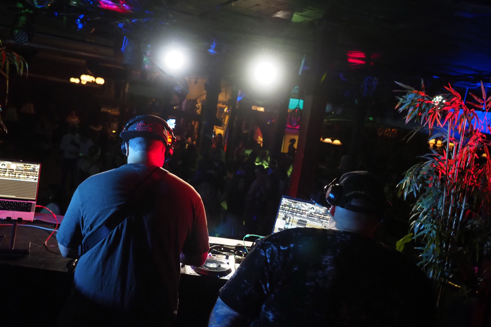 View from behind the DJ booth looking out over the crowd at a Bump & Grind night
